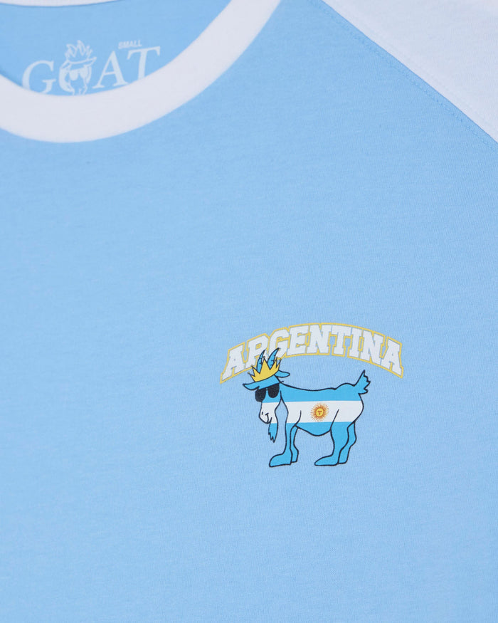 Light blue shirt with 'ARGENTINA' and a goat logo on a white collar