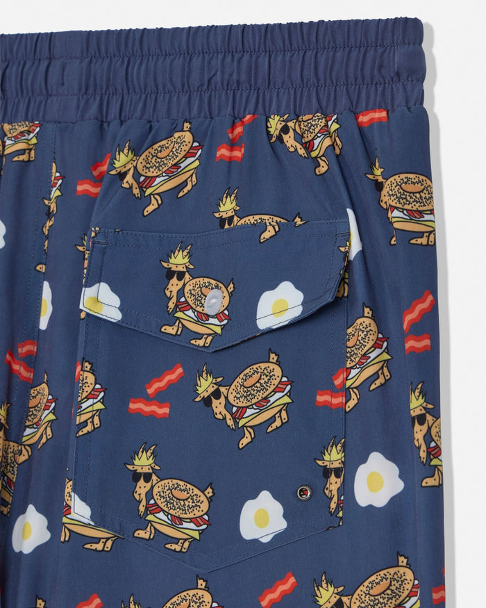 Navy shorts with cartoonish egg sandwich goat pattern on a white background