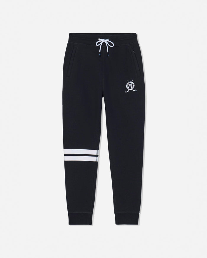 Black sweatpants with a white drawstring, a small white crest logo on the left thigh, and two horizontal white stripes near the lower left leg, shown against a light gray background.