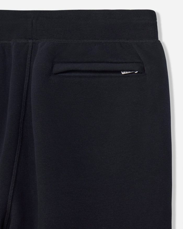 Close-up of a black sweatpants with a white background