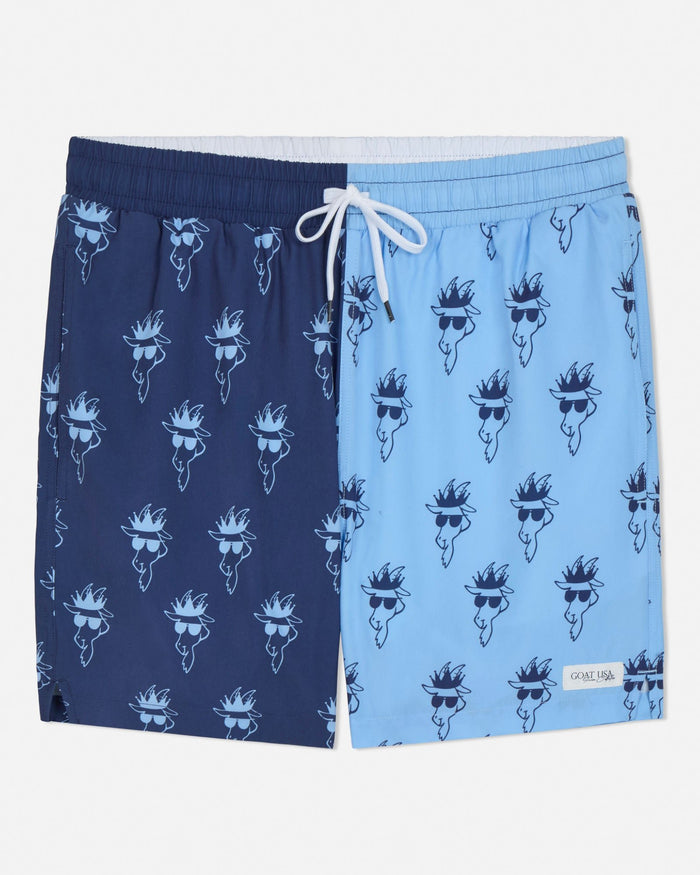 Pair of blue swim shorts with goat wearing sunglasses pattern on a white background