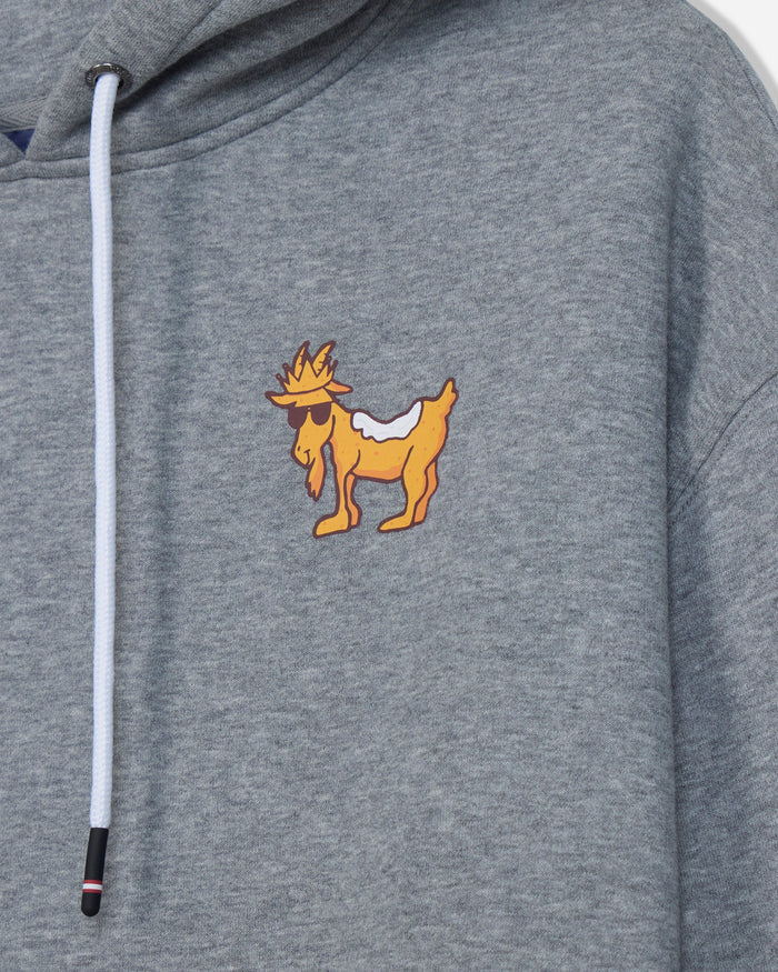Close-up of a heather gray hoodie featuring a cartoon goat graphic on the left chest with a white drawstring.