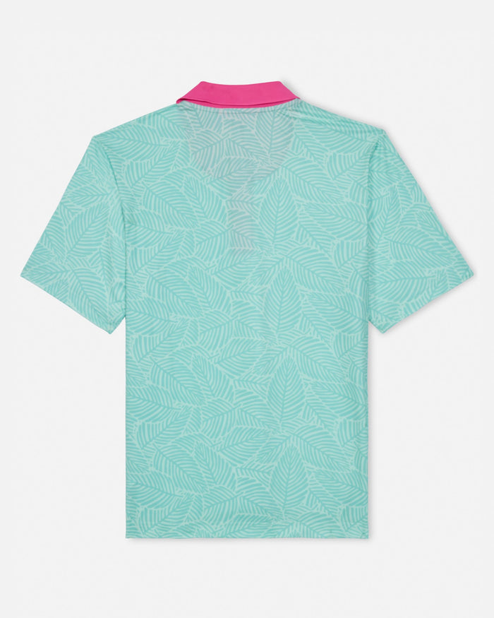 Green patterned polo shirt with pink collar on a white background