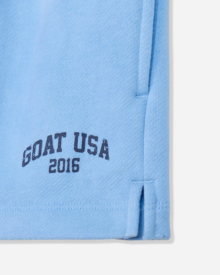 Close-up of carolina blue sweat shorts with 'GOAT USA 2016' text#color_carolina-blue