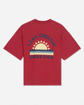 Back of red oversized t-shirt with sunset graphic and 'Lazy Chillin GOAT USA' text