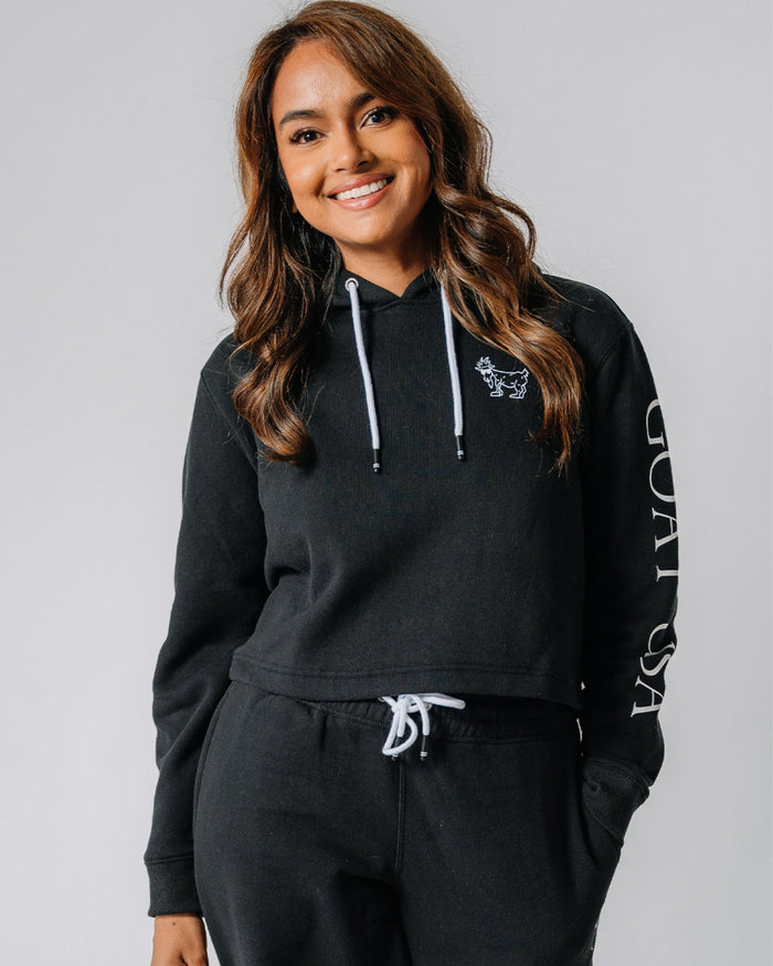 Model wearing black Women's OG Cropped Hooded Sweatshirt#color_black
