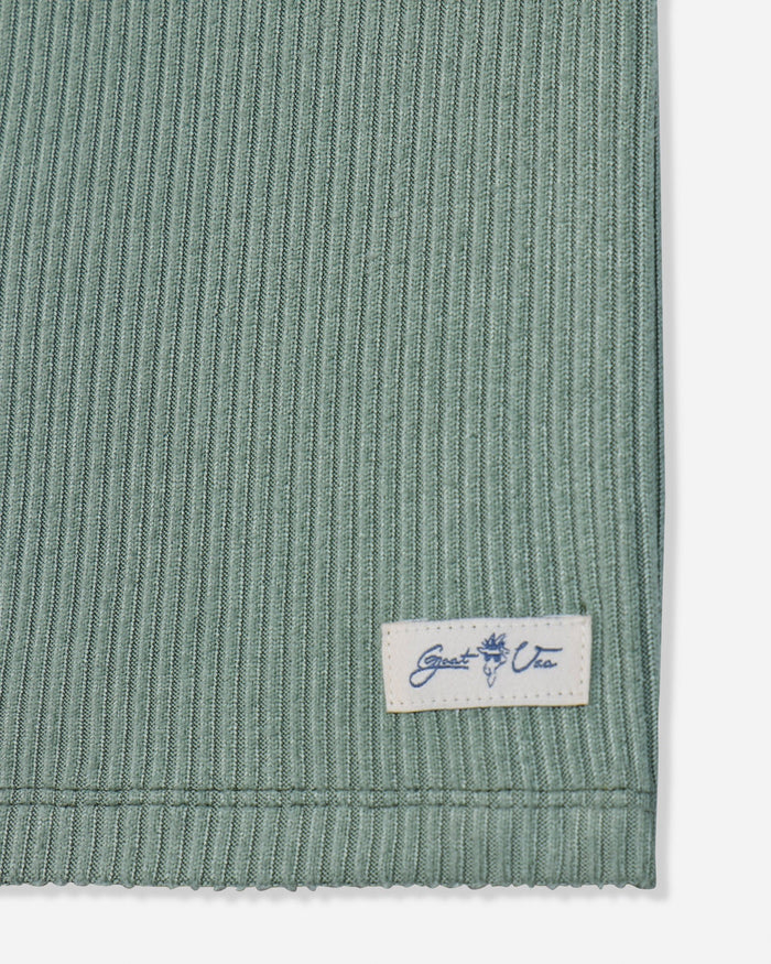 Close-up of patch on steeped sage pajama tank#color_steeped-sage