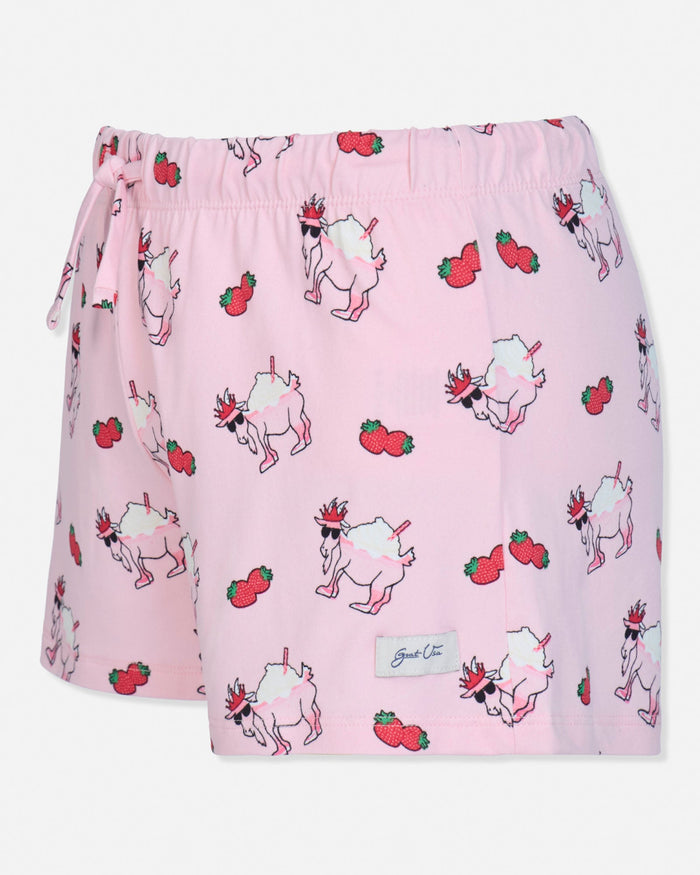 Pink shorts with goat and strawberry pattern on a white background