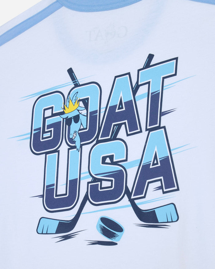 Close-up of GOAT USA hockey graphic on a white t-shirt with light blue trim