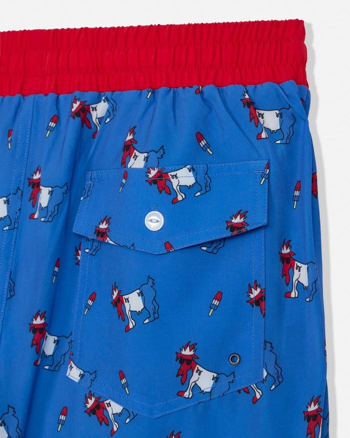 Blue swim shorts with red waistband and cartoon goat pattern on a white background