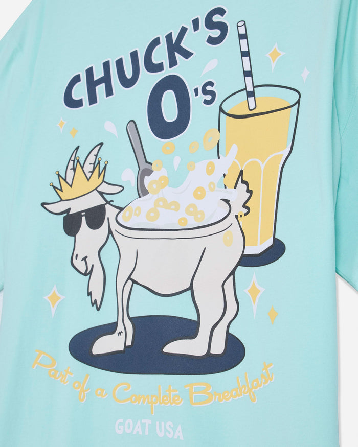 Close-up of mint t-shirt with cereal goat graphic and text that reads 'Chuck's O's Part of a Complete Breakfast'