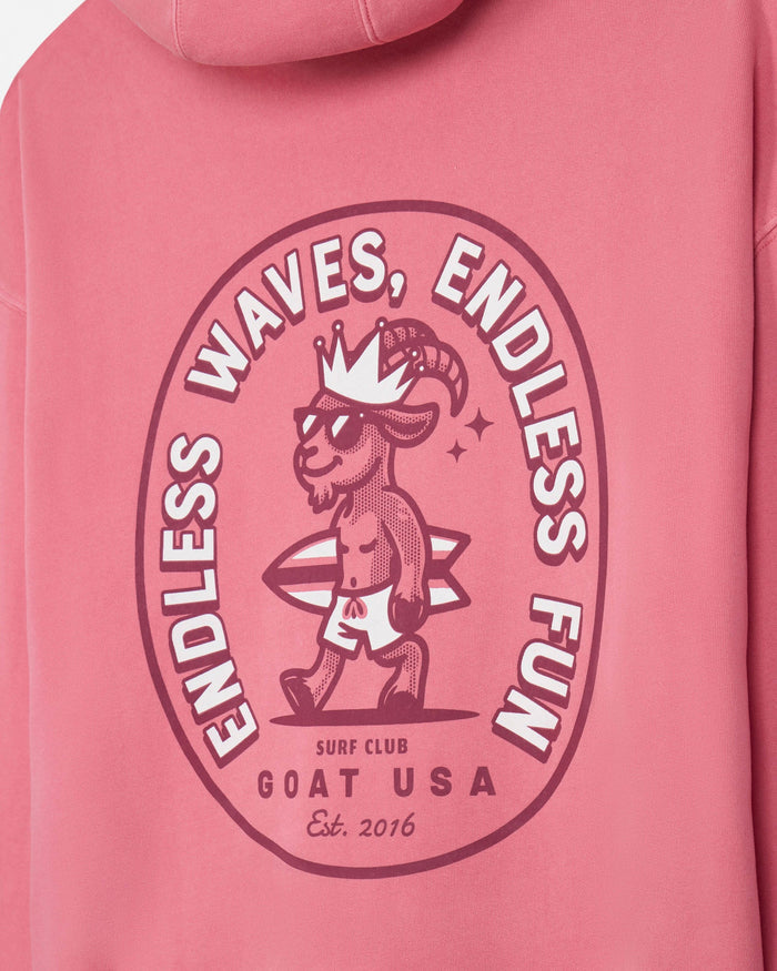 Salmon-colored hoodie with a graphic design of a goat and text on a pink background