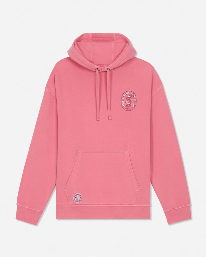 Salmon-colored hoodie with a logo on a light gray background