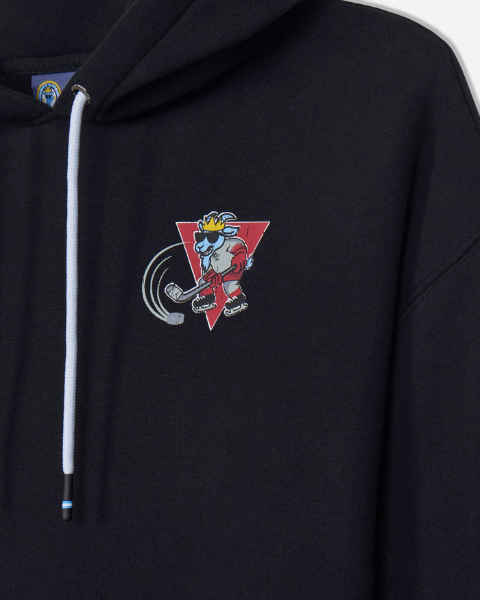 Close-up of a black pullover hoodie with a white drawstring and a colorful cartoon graphic on the left chest, featuring a red triangle and a character in a yellow crown.