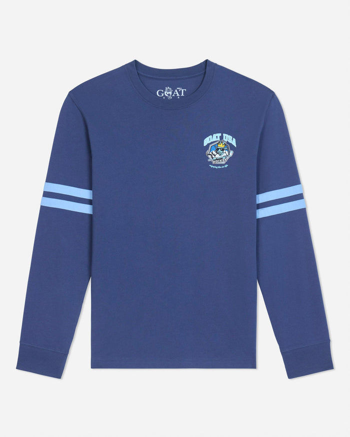 A blue long-sleeve crewneck shirt with light blue stripes on the sleeves and a small graphic on the left chest, displayed on a light gray background.