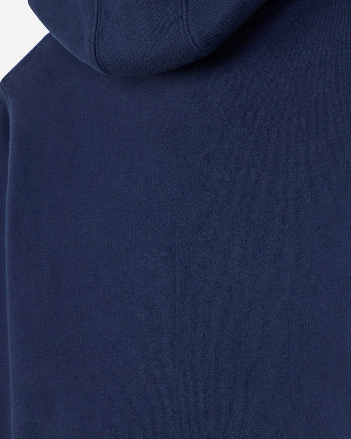 Close-up of a navy blue hooded sweatshirt showing the fabric texture and hood seam.