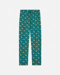 Teal pajama pants with taco pattern on a white background