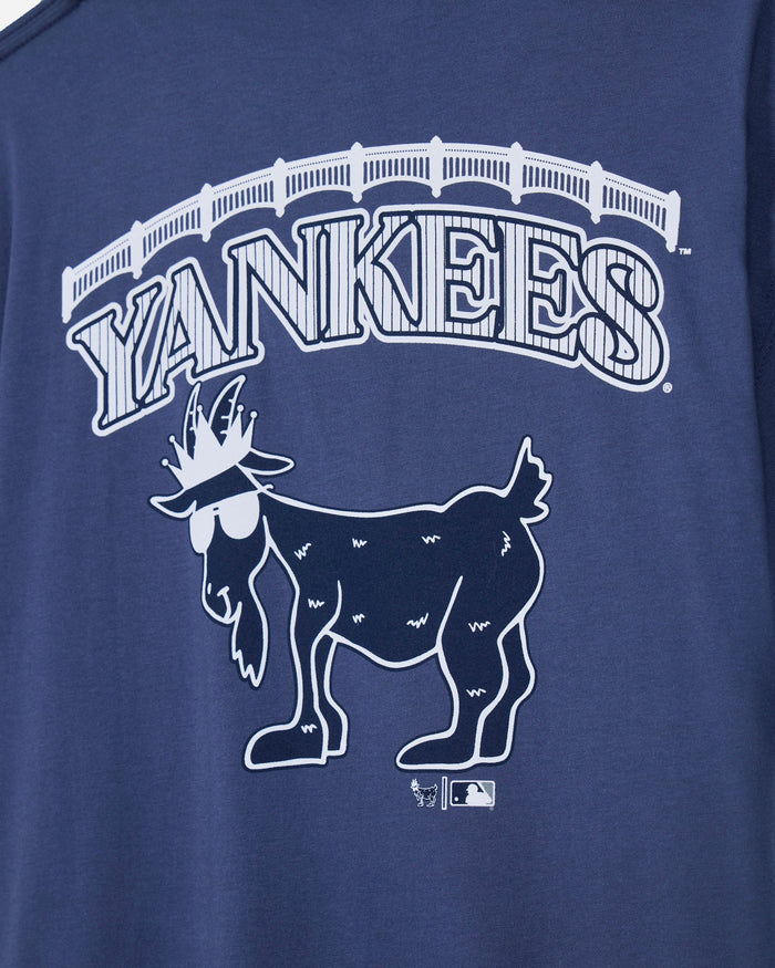 Close-up of a navy blue t-shirt featuring a white graphic of the New York Yankees logo, including the word 'YANKEES' in an arched font and a stylized goat mascot wearing sunglasses.#color_navy