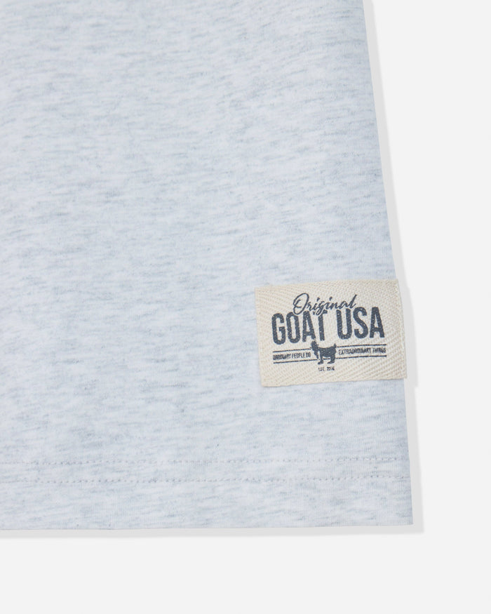 Close-up if stitch patch on light gray t-shirt