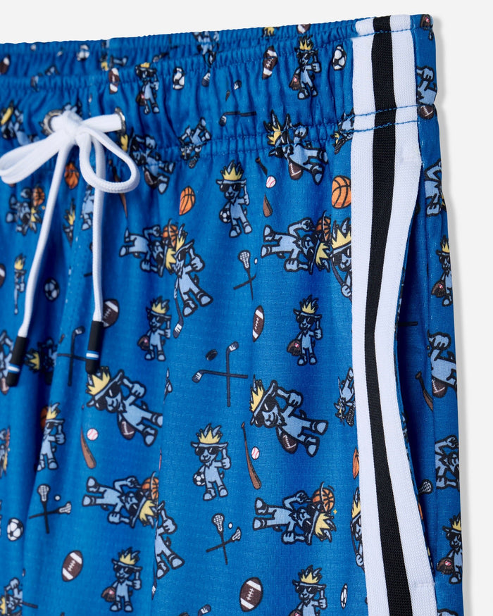 Close-up of blue athletic shorts with an allover cartoon sports player print, white drawstring, and a black-and-white side stripe.