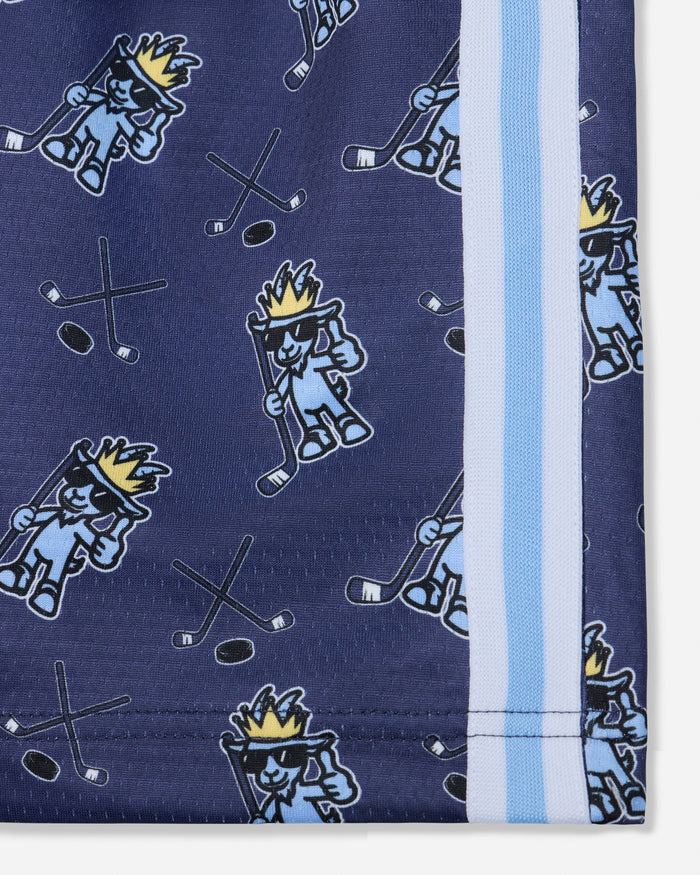 Close-up of seam of navy mesh shorts with blue goat and hockey design
