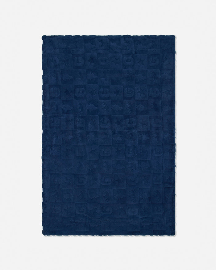 A dark navy blue rectangular blanket with a textured, embossed checkerboard pattern and fringed edges, shown flat against a light gray background.