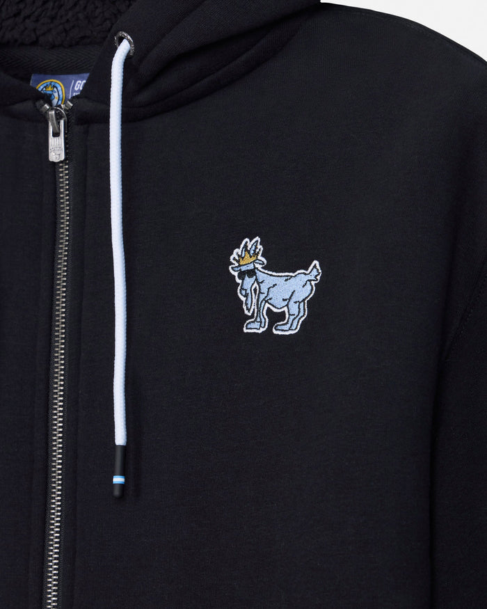 Close-up of a black zip-up hoodie featuring a white drawstring, a silver zipper, and a light blue embroidered goat mascot logo on the left chest.#color_black