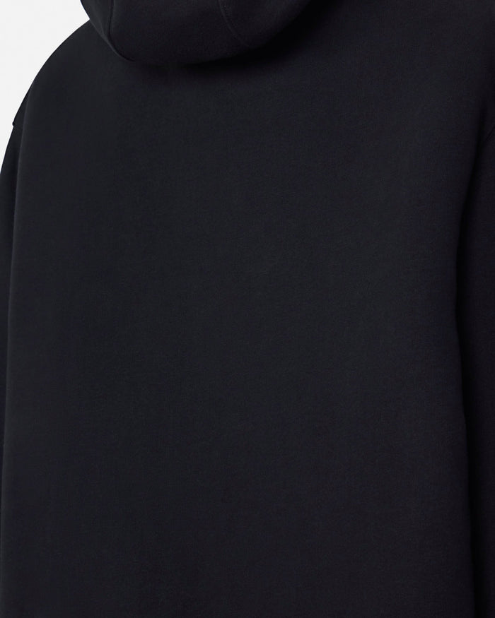 Close-up of a black hooded sweatshirt showing the back panel and hood against a plain light background.#color_black