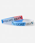 Two wristbands with 'GOAT USA' text on a white background