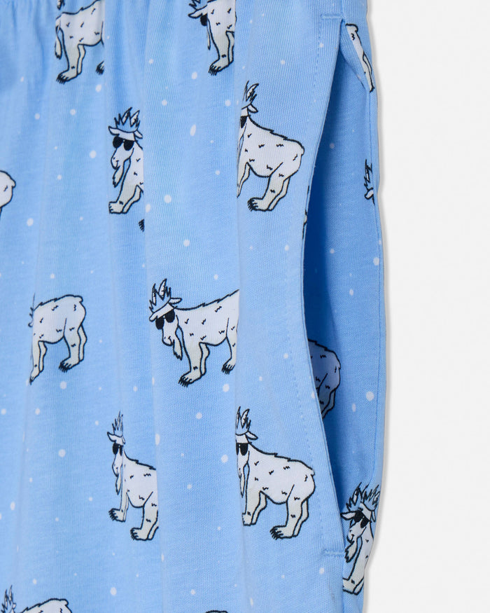 Blue fabric with white cartoon-like animal designs on a light blue background