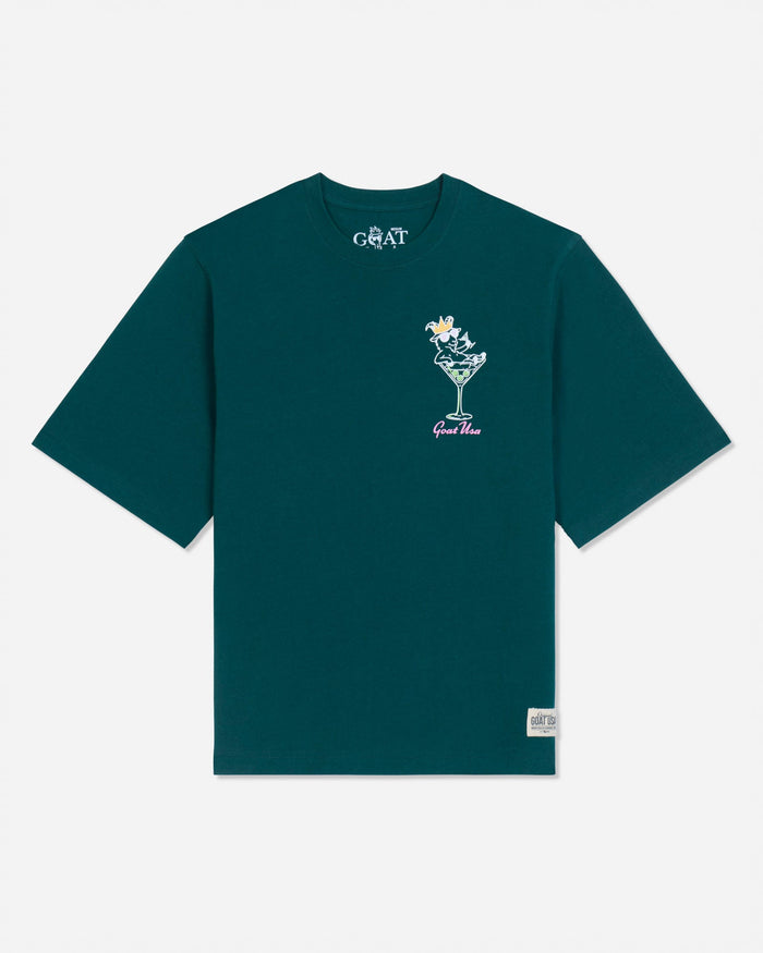 Front of sage t-shirt with martini glass goat left-chest logo