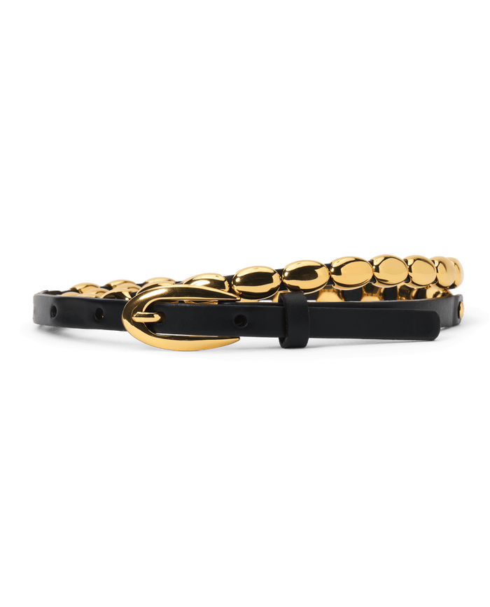 The Beaded Belt in Black With Gold by THE GREAT. F26 STETSON features top-grain leather adorned with oval gold links and a gold-toned buckle, showcased on a plain white background—a refined accessory that embodies timeless Western craftsmanship.