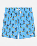 Blue swim shorts with cartoon character pattern on a light gray background