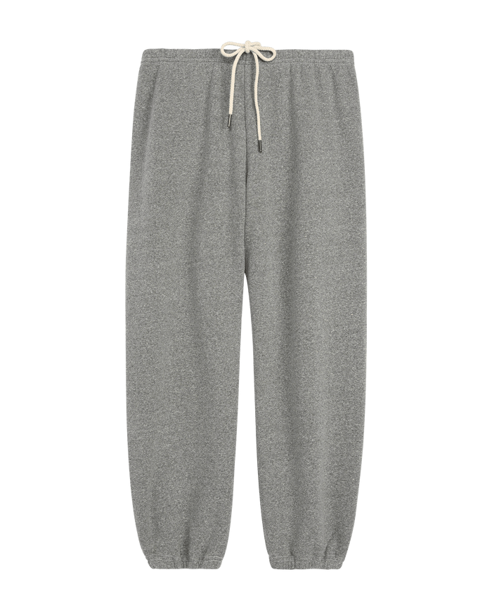 The Fleece Stadium Sweatpant by THE GREAT. F26 D1 FLEECE BACK KNITS in Dark Heather Grey features an elastic waistband, white drawstring, and elastic cuffs, shown against a white background.
