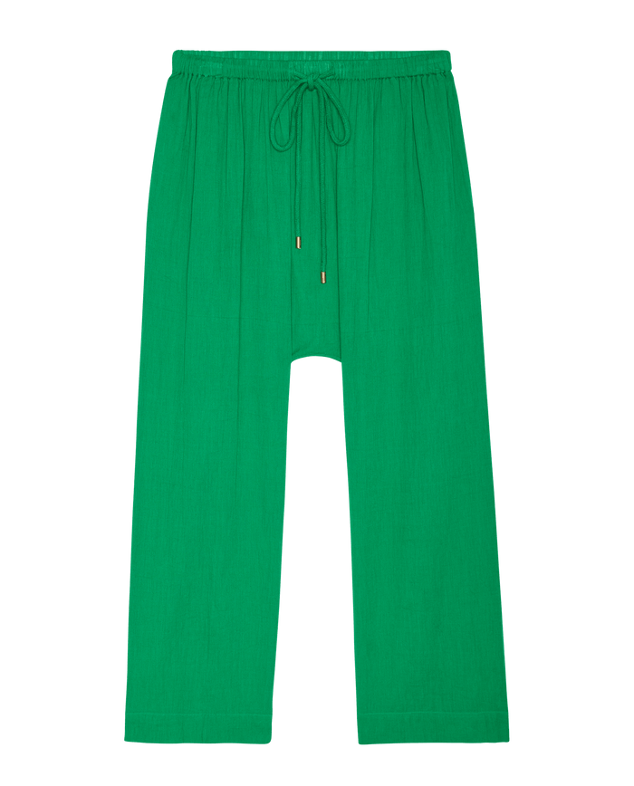 The Reef Pant in Bright Sprig by THE GREAT. SP26 SWIM—wide-leg women’s trousers with an elastic waistband and drawstring, laid flat on a white background—ideal for everyday casual comfort.