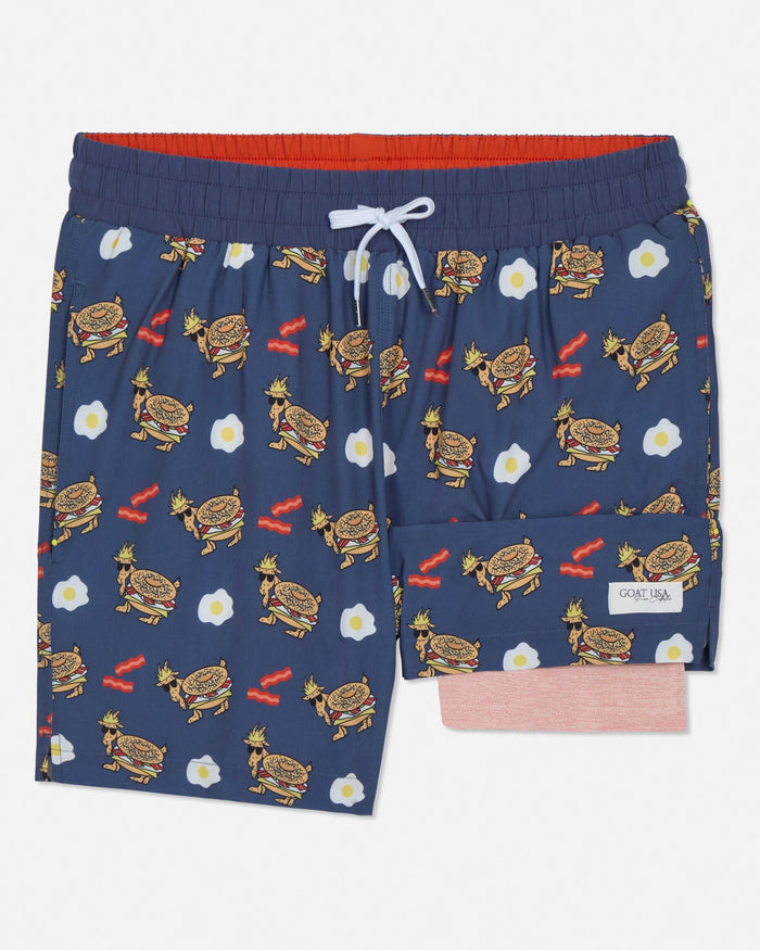 Navy shorts with food pattern on a white background
