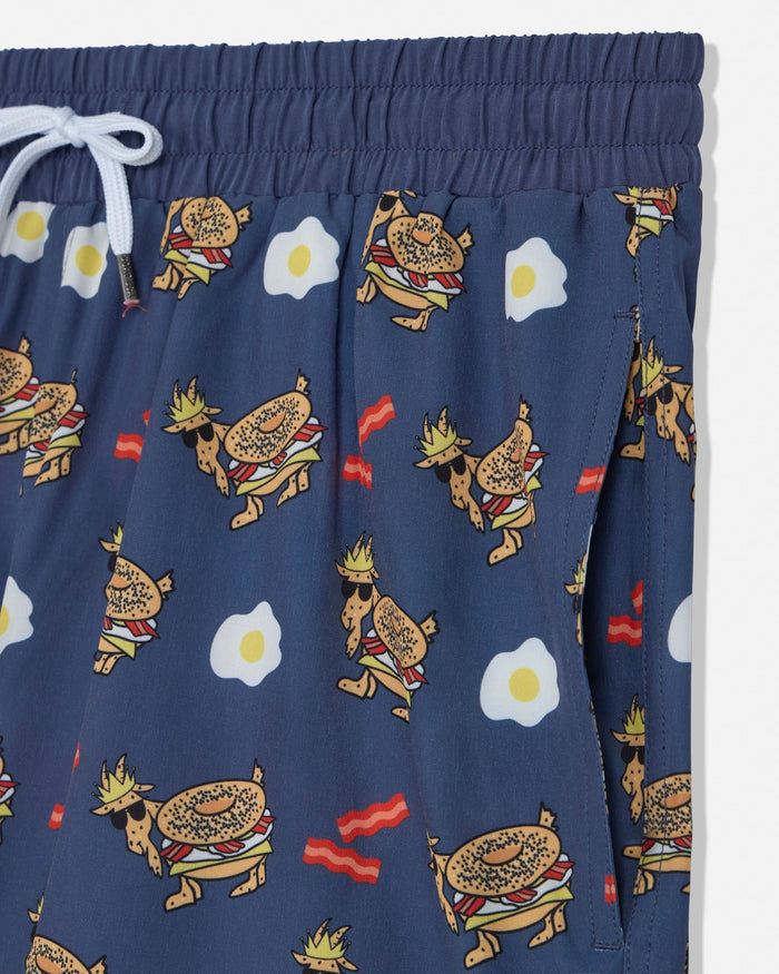 Navy shorts with cartoonish egg sandwich goat pattern on a white background