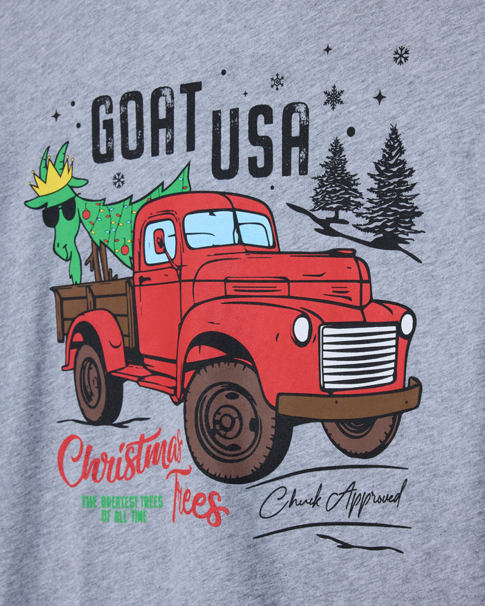 Gray t-shirt with a red truck and goat graphic, labeled 'GOAT USA Christmas Trees', on a gray background.