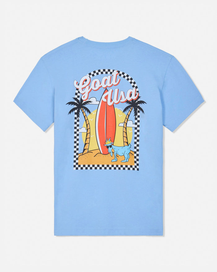 Light blue t-shirt with a graphic design of palm trees, a surfboard, and text on a white background