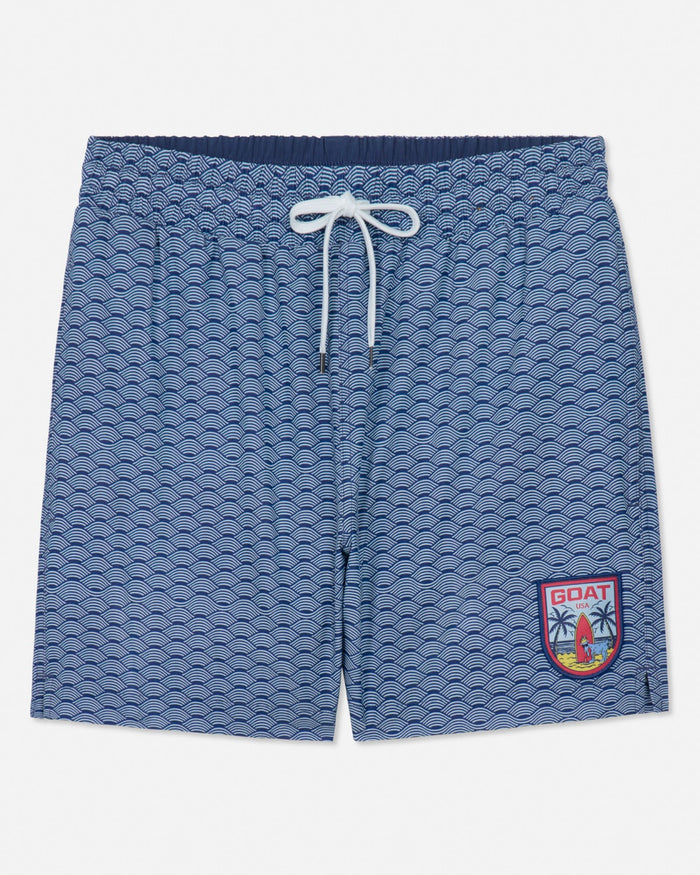 Blue patterned shorts with a logo on a white background