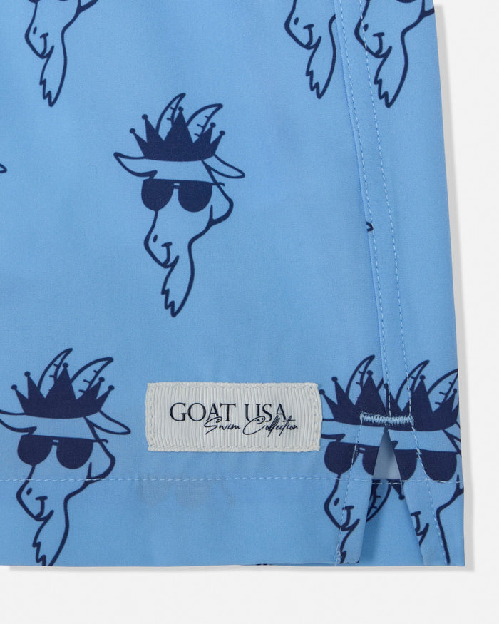 Blue swim shorts with goat illustrations and 'GOAT USA' label