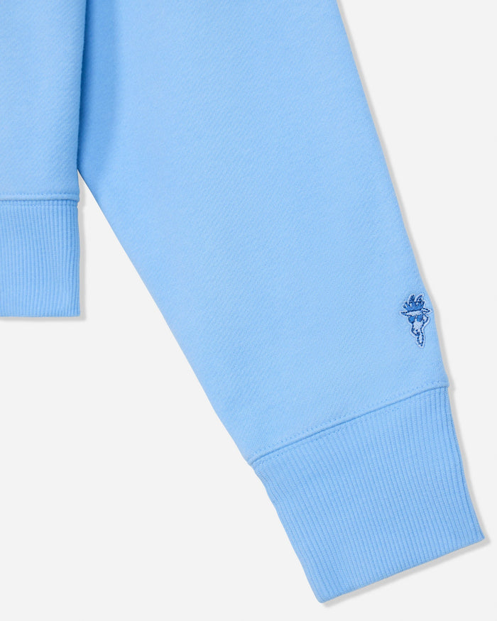 Close-up of sleeve on oversized carolina blue crewneck#color_carolina-blue