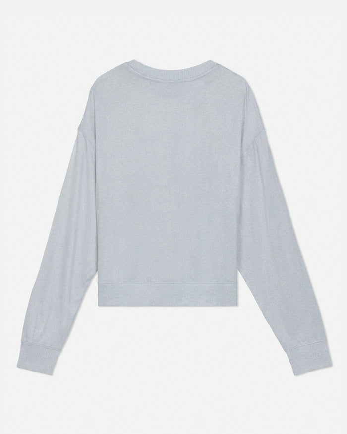 Light gray sweatshirt on a light gray background
