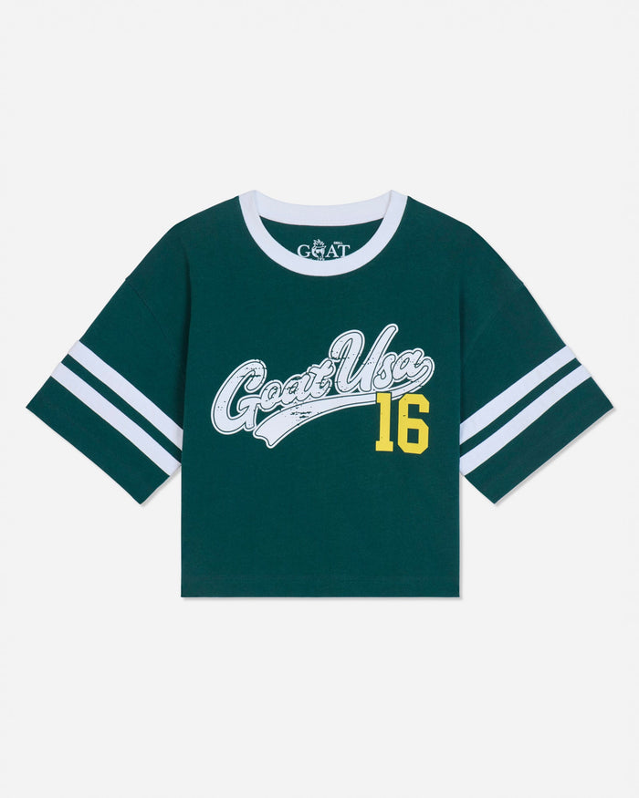 A dark green short-sleeve t-shirt with white and yellow graphics. The front features 'GOAT USA' in white script with a yellow '16' underneath, and white stripes on the sleeves.